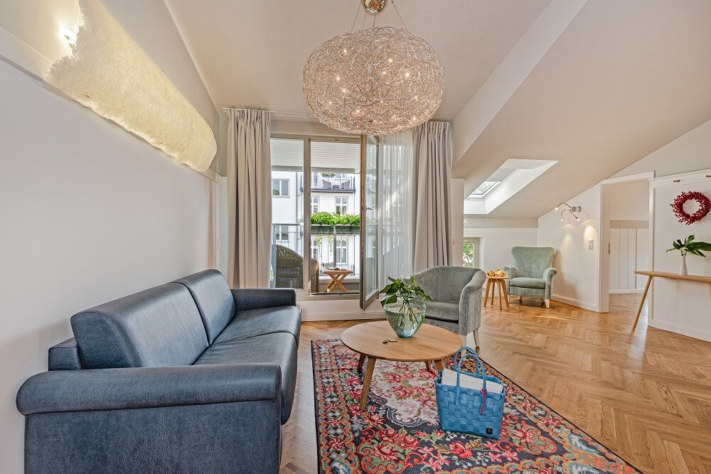 living area, family suite, 3 bedrooms, 1 double bed, 2 single beds, sofa bed, maximum 5 people, seating area, design, top floor, Catellani & Smith, book here!